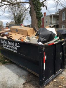 Junk in a Blue Box Rentals dumpster from the Hagerstown, MD-based dumpster rental company.